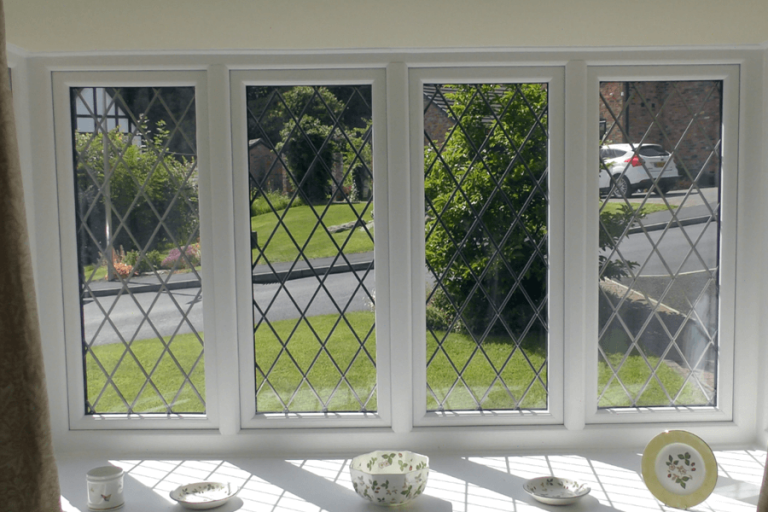 Mr and Mrs Small white windows.