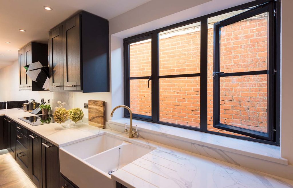 Kitchen with black origin windows