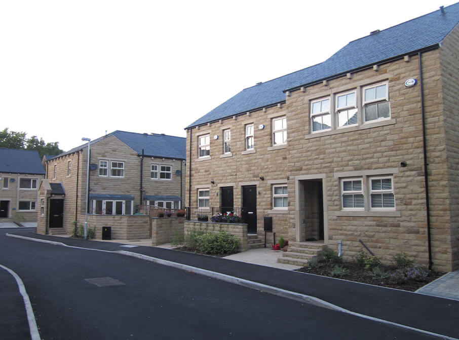 Housing Development With Cream uPVC Windows And Black Composite Doors